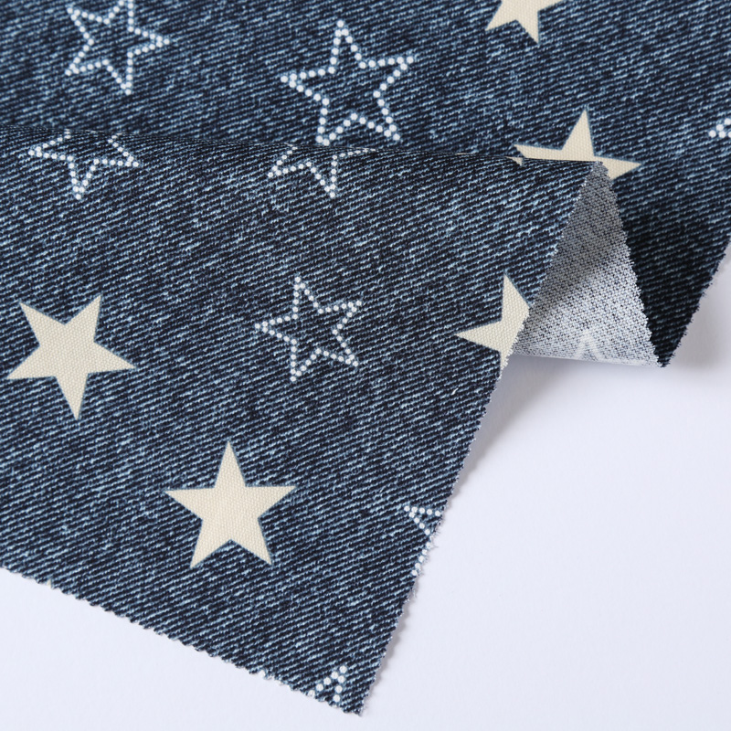 デニム調プリント 4900-4 オックス生地に星柄が描かれています / Denim-like print 4900-4 A star pattern is drawn on the Oxford cloth.